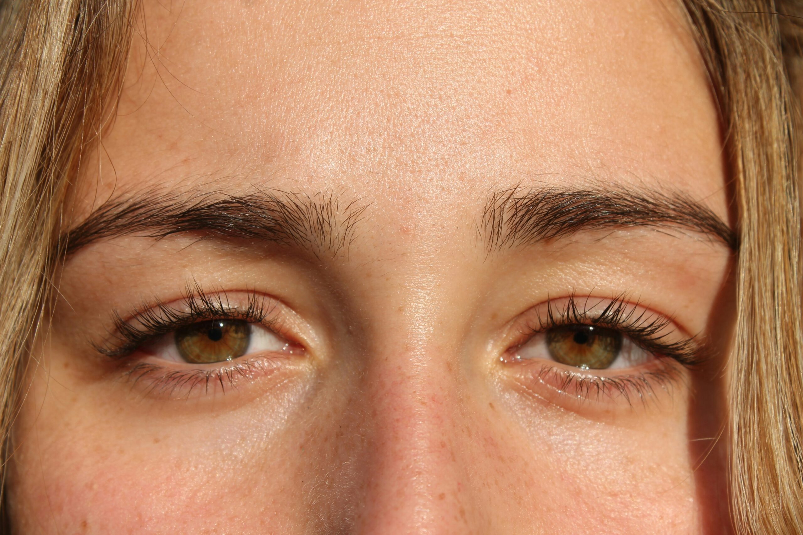 Examples of unique editorial makeup placements such as under-eye liner or floating crests