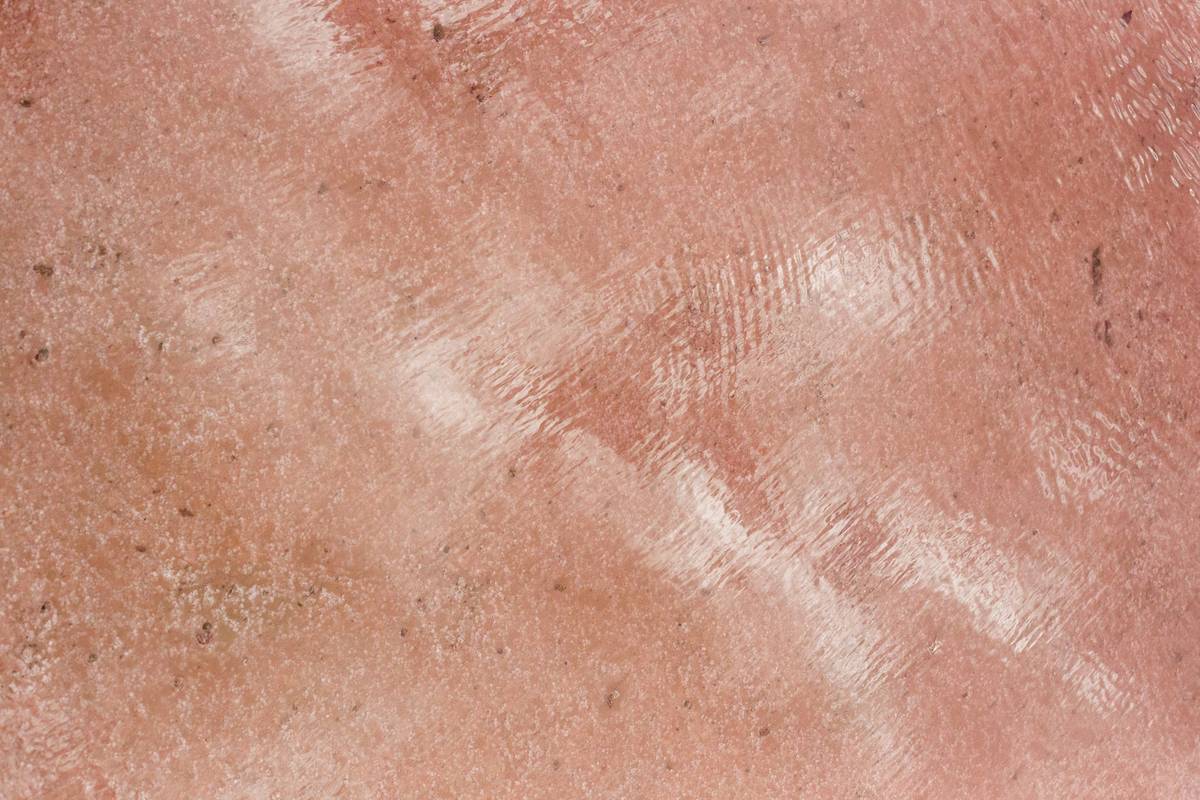 A close-up image showing different makeup finishes like matte, dewy, and satin textures.