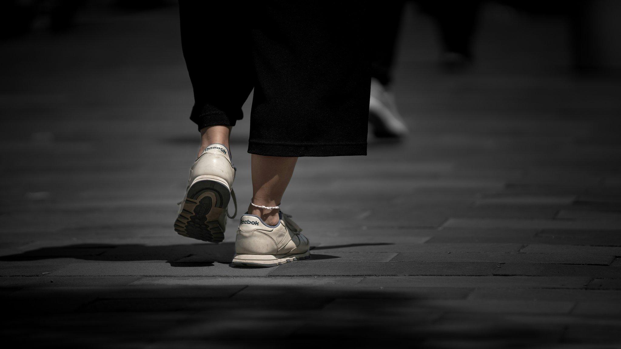 Close-up shot of dramatic editorial eye makeup featuring bold colors and sharp lines